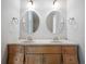 Bathroom vanity with double sinks and oval mirrors at 1276 Lanier Ne Blvd, Atlanta, GA 30306