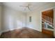 Bedroom with wood floors, white walls and trim, ceiling fan, and natural light at 1276 Lanier Ne Blvd, Atlanta, GA 30306