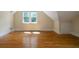 Bonus room with wood flooring, window, and closet at 1276 Lanier Ne Blvd, Atlanta, GA 30306