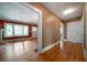 Spacious home entryway featuring hardwood floors with views into the living room through an open doorway at 1276 Lanier Ne Blvd, Atlanta, GA 30306