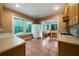 Eat-in kitchen area featuring tile floors, windowed breakfast nook and view to the backyard at 1276 Lanier Ne Blvd, Atlanta, GA 30306