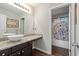 Bathroom features a granite countertop, hardwood floors, and shower at 140 Melrose Creek Dr, Stockbridge, GA 30281