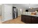 Modern kitchen featuring stainless steel appliances, granite counters, and tile flooring at 140 Melrose Creek Dr, Stockbridge, GA 30281