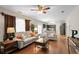 Open living room with hardwood flooring and comfortable sofas at 140 Melrose Creek Dr, Stockbridge, GA 30281