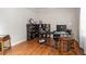 Bright office area with desk, storage, and hardwood floors at 140 Melrose Creek Dr, Stockbridge, GA 30281
