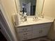 Bathroom sink and vanity with white countertop provides ample storage at 349 Bald Rock Rd, Oxford, GA 30054
