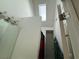Bathroom features a skylight, elongated mirror, and mural at 349 Bald Rock Rd, Oxford, GA 30054