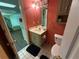 Small bathroom featuring a toilet and sink at 349 Bald Rock Rd, Oxford, GA 30054