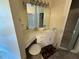 Bathroom vanity with mirror, white cabinets, stool, and shower at 349 Bald Rock Rd, Oxford, GA 30054