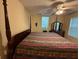 Cozy bedroom featuring a ceiling fan, and natural light from the window at 349 Bald Rock Rd, Oxford, GA 30054