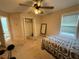 Bedroom with wall to wall carpeting, a closet, and double windows at 349 Bald Rock Rd, Oxford, GA 30054