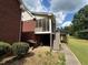 Exterior view featuring a screened porch, deck, and a stone pathway at 349 Bald Rock Rd, Oxford, GA 30054