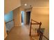 Hallway featuring carpeted floor and access to the staircase at 349 Bald Rock Rd, Oxford, GA 30054
