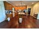 Open kitchen with wood cabinets, an island and stainless steel refrigerator at 349 Bald Rock Rd, Oxford, GA 30054