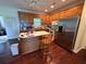 Kitchen with stainless steel appliances, wood cabinets, and spacious island at 349 Bald Rock Rd, Oxford, GA 30054
