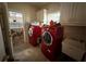 Modern laundry room with washer, dryer, and sink for added convenience at 349 Bald Rock Rd, Oxford, GA 30054