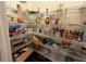 Walk-in pantry with wire shelving provides great storage for food items at 349 Bald Rock Rd, Oxford, GA 30054