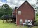 Attractive brick home with a spacious deck, perfect for outdoor entertaining at 349 Bald Rock Rd, Oxford, GA 30054