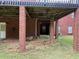 Spacious under-deck area with brick supports, offering ample space for storage or outdoor activities at 349 Bald Rock Rd, Oxford, GA 30054