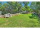 Backyard featuring a large grassy area and a storage shed at 1331 Memorial Se Dr, Atlanta, GA 30317