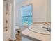 Bathroom with a double sink, walk in shower and tile floor at 1331 Memorial Se Dr, Atlanta, GA 30317