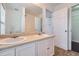 Bathroom featuring double sinks and access to walk in closet at 1331 Memorial Se Dr, Atlanta, GA 30317