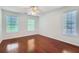 Spacious bedroom with hardwood floors and large windows at 1331 Memorial Se Dr, Atlanta, GA 30317