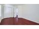 A bedroom featuring beautiful hardwood floors and a spacious closet at 1331 Memorial Se Dr, Atlanta, GA 30317