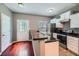 Well-equipped kitchen with sleek stainless-steel appliances and stylish granite countertops at 1331 Memorial Se Dr, Atlanta, GA 30317