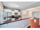 Bright kitchen featuring stainless steel appliances, and a granite countertop bar at 1331 Memorial Se Dr, Atlanta, GA 30317
