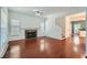 Bright living room featuring a fireplace, hardwood floors, and ample natural light at 1331 Memorial Se Dr, Atlanta, GA 30317