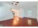 Inviting living room with hardwood floors and an open floorplan to the dining area and kitchen at 1331 Memorial Se Dr, Atlanta, GA 30317