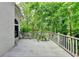 Large back deck perfect for entertaining surrounded by trees at 1595 Chadberry Way, Lawrenceville, GA 30043