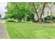 Well-manicured lawn and landscaping frame this home on a quiet street, offering great curb appeal at 1595 Chadberry Way, Lawrenceville, GA 30043