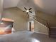 Open living room with tall ceilings and staircase leading to a second story at 1595 Chadberry Way, Lawrenceville, GA 30043