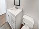 Bathroom featuring white vanity with white countertop, and a toilet at 3968 Oak Glenn Dr, Duluth, GA 30096
