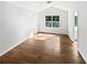 Spacious bedroom with wood floors, natural light, and a high ceiling at 3968 Oak Glenn Dr, Duluth, GA 30096