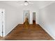 Large bedroom showing the wooden floors, white walls, and doorways at 3968 Oak Glenn Dr, Duluth, GA 30096
