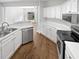 Contemporary kitchen featuring stainless steel appliances and white cabinets at 3968 Oak Glenn Dr, Duluth, GA 30096