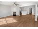 Spacious living room features wood flooring, fireplace and lots of natural light at 3968 Oak Glenn Dr, Duluth, GA 30096