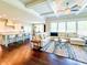 Spacious living room has an open floor plan that connects to the kitchen and breakfast nook at 724 Laura Jean Ct, Buford, GA 30518
