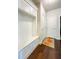 Mud room with built-in storage, seating, and decorative accents at 724 Laura Jean Ct, Buford, GA 30518