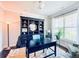 Bright office space featuring a large window with natural light and neutral color palette at 724 Laura Jean Ct, Buford, GA 30518