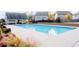 Sparkling community pool with ample space for lounging and enjoying the outdoors at 724 Laura Jean Ct, Buford, GA 30518