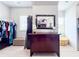 Well-organized walk-in closet with shelving, drawers, and ample storage space at 724 Laura Jean Ct, Buford, GA 30518