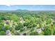 Scenic aerial view captures the neighborhood's tranquil setting and proximity to green spaces at 1206 Mountainside Nw Trce, Kennesaw, GA 30152