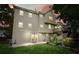 The backyard has a patio, second story deck, and a garden for outdoor relaxation and entertainment at 1206 Mountainside Nw Trce, Kennesaw, GA 30152