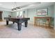Finished basement featuring tile flooring, a pool table illuminated by stylish pendant lights, and bar seating at 1206 Mountainside Nw Trce, Kennesaw, GA 30152