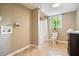Charming bathroom featuring neutral tile, with a shower and vanity at 1206 Mountainside Nw Trce, Kennesaw, GA 30152