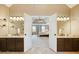 Bathroom view featuring double vanity sinks leading to a bedroom at 1206 Mountainside Nw Trce, Kennesaw, GA 30152